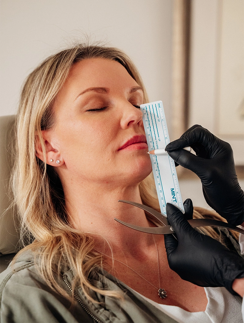 Woman receiving Biologique Recherche facial treatment with professional skincare device and serum application - PDO Threadlift Non Surgical Facelift in Bend, OR